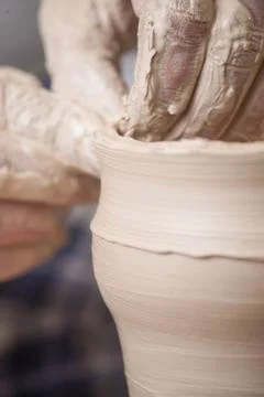 Hands of a potter Stock Photos
