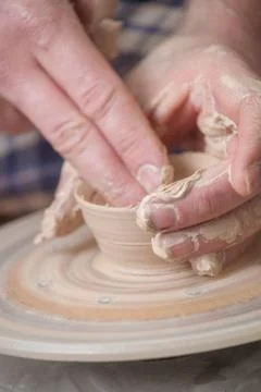 Hands of a potter Stock Photos
