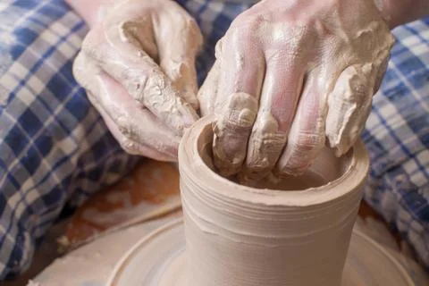 Hands of a potter Stock Photos