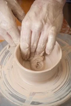 Hands of a potter Stock Photos