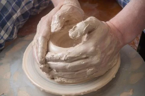 Hands of a potter Stock Photos