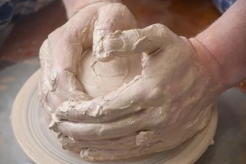 Hands of a potter Stock Photos