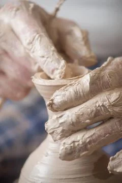 Hands of a potter Stock Photos