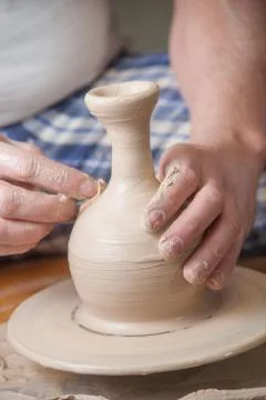 Hands of a potter Stock Photos