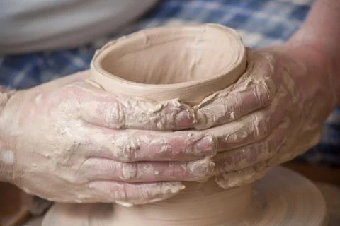 Hands of a potter Stock Photos