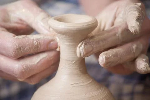 Hands of a potter Stock Photos