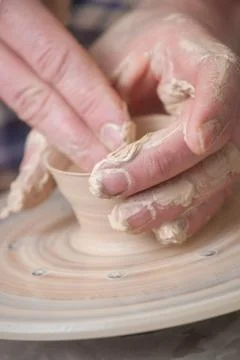 Hands of a potter Stock Photos
