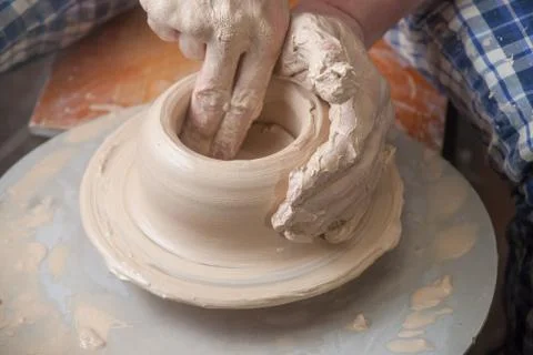 Hands of a potter Stock Photos