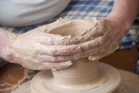 Hands of a potter Stock Photos
