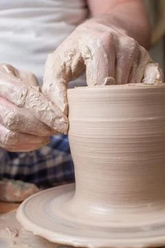 Hands of a potter Stock Photos