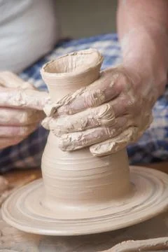 Hands of a potter Stock Photos