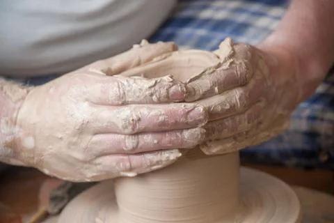 Hands of a potter Stock Photos