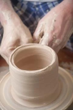 Hands of a potter Stock Photos