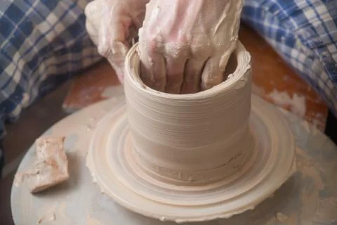 Hands of a potter Stock Photos