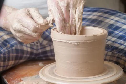 Hands of a potter Stock Photos