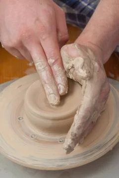 Hands of a potter Stock Photos