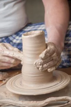Hands of a potter Stock Photos