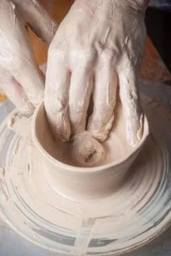 Hands of a potter Stock Photos