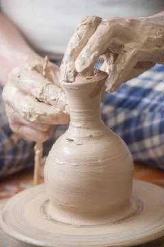 Hands of a potter Stock Photos