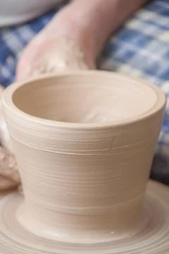 Hands of a potter Stock Photos
