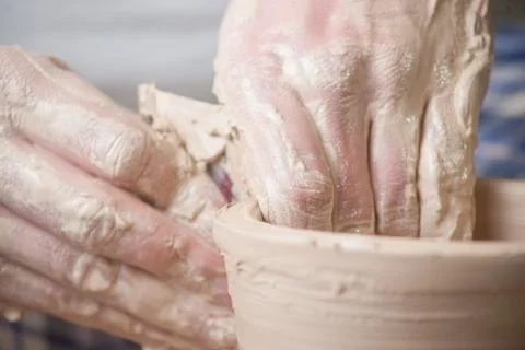 Hands of a potter Stock Photos
