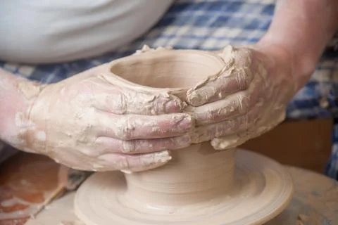 Hands of a potter Stock Photos