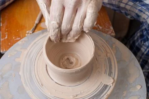 Hands of a potter Stock Photos
