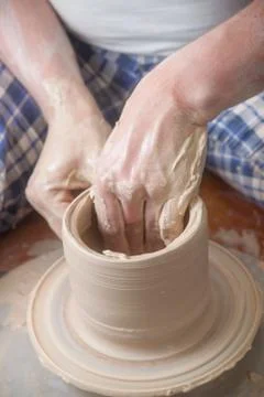 Hands of a potter Stock Photos
