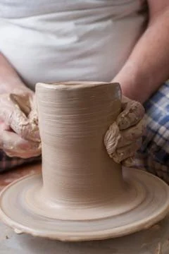 Hands of a potter Stock Photos