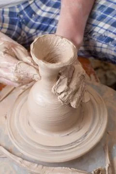 Hands of a potter Stock Photos
