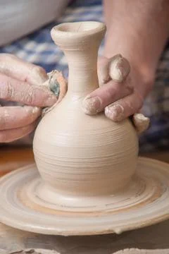 Hands of a potter Stock Photos