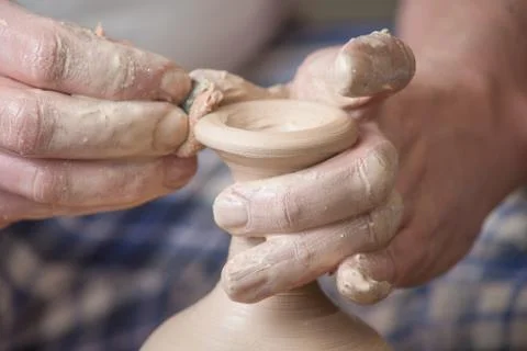 Hands of a potter Stock Photos