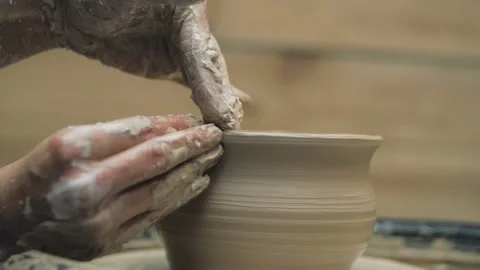Hands Of Potter. Potter Making Ceramic Pot On A Potter's Wheel. Potter At Work Stock Footage 117504845