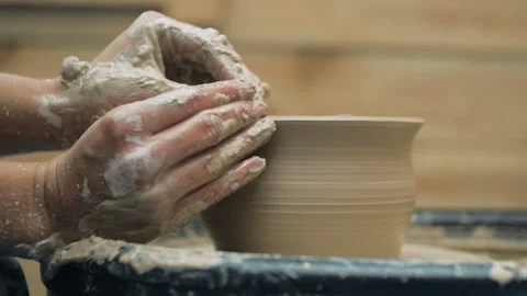 Hands Of Potter. Potter Making Ceramic Pot On A Potter's Wheel. Potter At Work Stock Footage 117505549