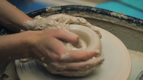 Hands Of Potter. Potter Making Ceramic Pot On A Potter's Wheel. Potter At Work Stock Footage 117505645
