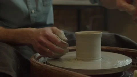 Hands Of Potter. Potter Making Ceramic Pot On A Potter's Wheel. Potter At Work Video stock 236202360