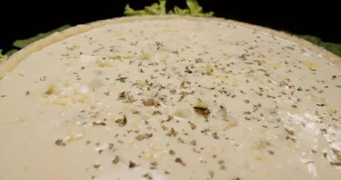 Hands Pouring Cheese Cooking a Pie, Quiche, Close Up Detail, Cinematic, Spinning Stock Footage 242440873