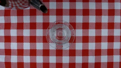 Hands pouring Turkish style tea in the traditional glass 動画素材 120249705