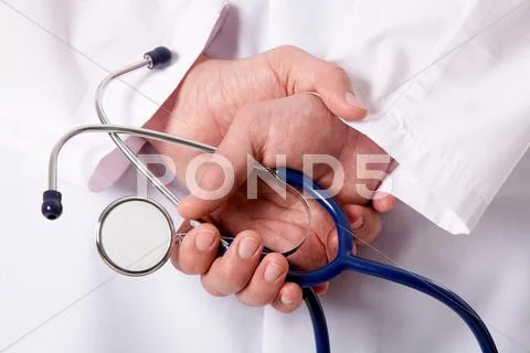 Hands of practitioner with stethoscope Stock Photos