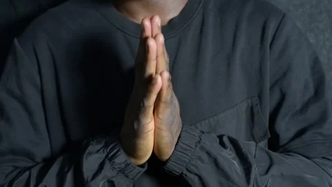 Hands in prayer Stock Footage 277437621