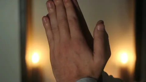 Hands praying Stock Footage 10897388