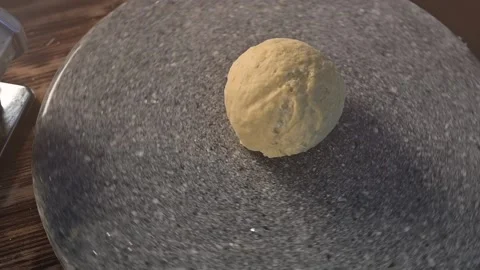 Hands prepare the dough. Chef preparing homemade pasta dough in slow motion Stock Footage 134057408