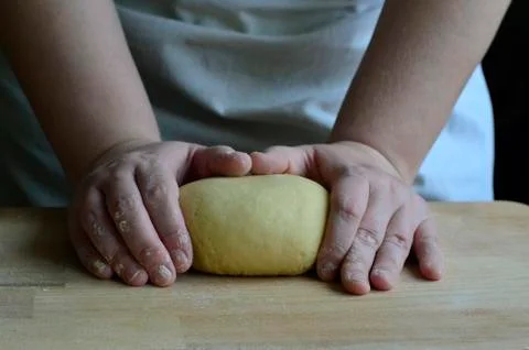 Hands preparing the dough Stock Photos