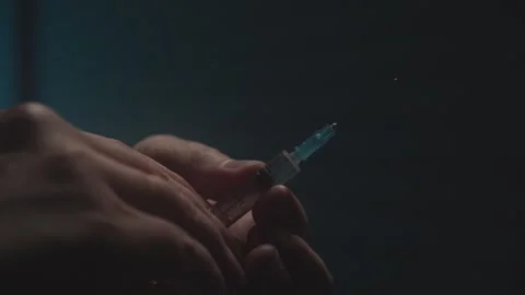 Hands Preparing Syringe with Droplet Stock Footage 280551458
