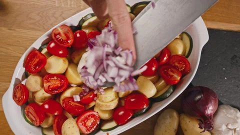 Hands preparing vegetables with onions Stock Footage 245701675