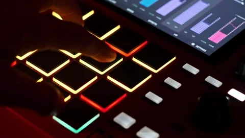Hands Pressing Multi-Colored Light-Up Drum Pads Stock Footage 314013832