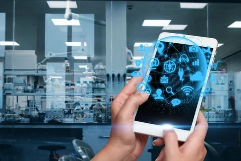 Hands Pressing Screen Of Mobile Phone In Laboratory Showing The Futuristic .. Stock Photos