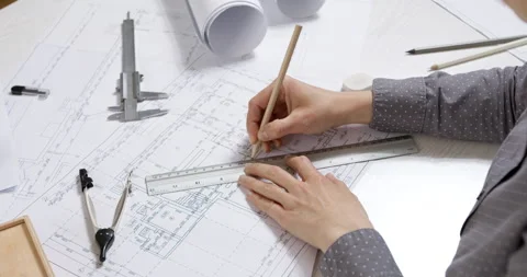 The hands of a professional architect draw a sketch of a design project. 4K. Stock Footage 154509841