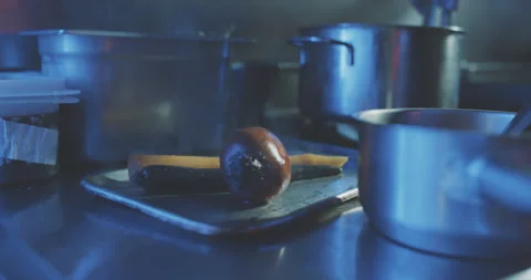 Hands of professional chef putting steaming vegetables to plate Stock Footage 203559102