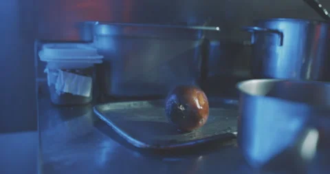 Hands of professional chef removing boiling vegetables from water Stock Footage 203558796